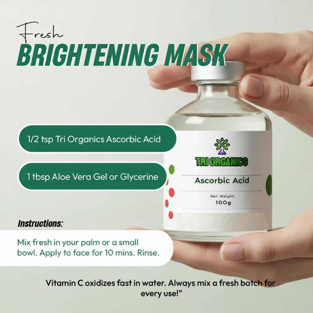 Hand holding Tri Organics Ascorbic Acid powder bottle for DIY brightening face mask recipe