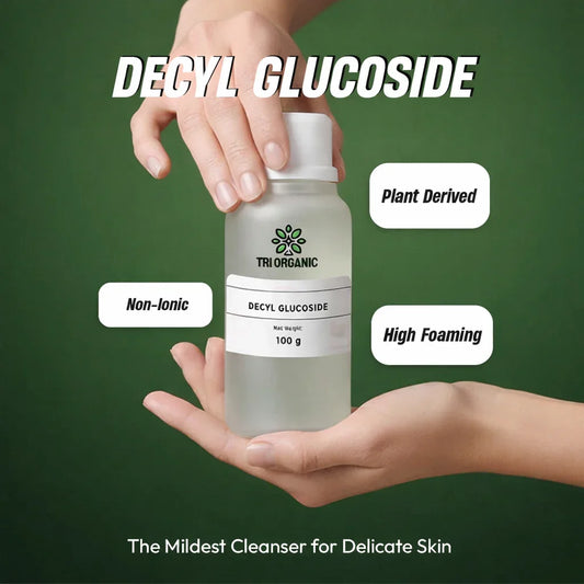 Decyl Glucoside liquid bottle labeled 100g held by hands, non-ionic, plant derived, high foaming cleanser for delicate skin.