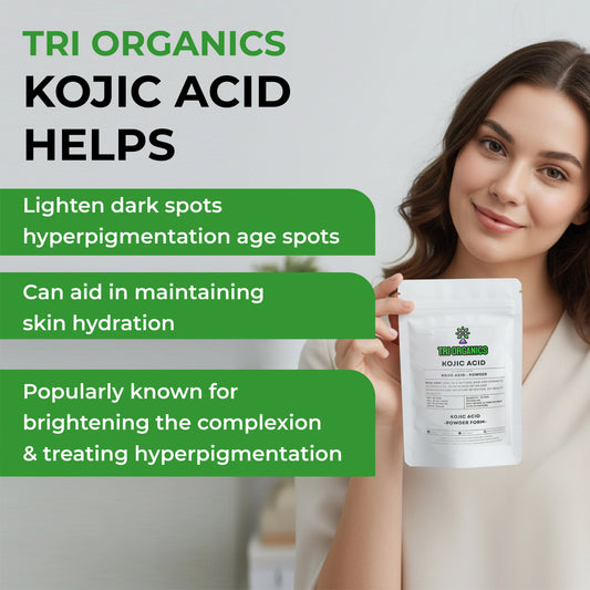 Woman holding a Tri Organics Kojic Acid powder pouch, with benefits for skin brightening and hydration displayed.