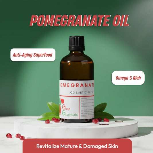 Amber bottle of pomegranate oil for skincare, with pomegranate seeds and green leaves